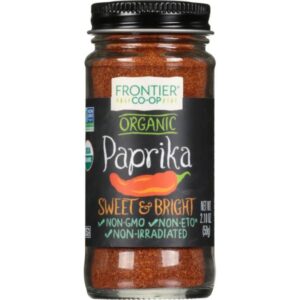 Ground organic paprika in a jar with natural color and flavor enhancement.