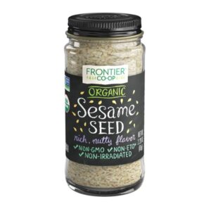 Frontier Organic Hulled Sesame Seeds in a glass bottle