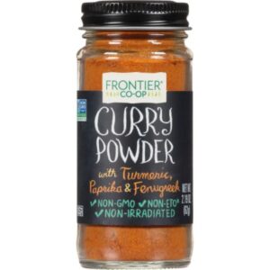 Frontier Co-op® Curry Powder glass bottle with metal cap, a salt-free spice blend.