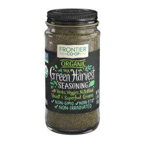 Front view of Green Harvest Organic Seasoning Blend in a glass bottle, highlighting its savory herb and superfood mix.