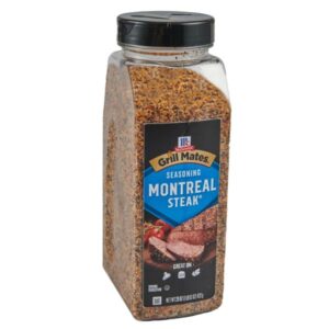McCormick Grill Mates Montreal Steak Seasoning 29 oz bottle on a wooden table
