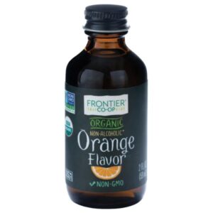 Frontier Co-op® Organic Orange Flavor bottle with a clear label showing 0.9Lb weight, non-alcoholic, and kosher certification.