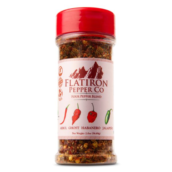 Flatiron Pepper Co Four Pepper Blend bottle with bold spice mix for cooking.