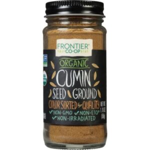 Ground cumin spice for cooking, in a container