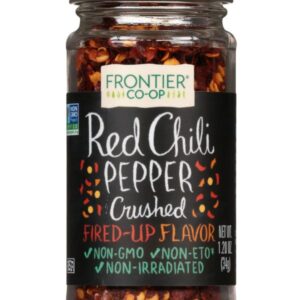 Frontier Co-op® Crushed Red Chili Pepper in a 0.39lb glass bottle, ideal for adding heat to dishes like marinara, soups, and grilled vegetables.
