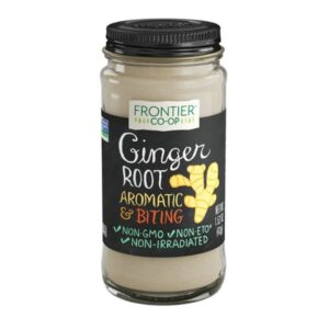 Frontier Co-op Ground Ginger Root in a 0.41lb glass bottle with a metal cap, showcasing its fine powder texture.