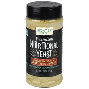 A jar of Frontier Co-op® Himalayan Pink Salt & Apple Cider Vinegar Nutritional Yeast Blend with shaker cap