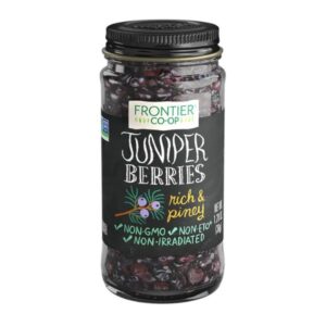 Close-up of Organic Whole Juniper Berries, showcasing their deep blue color and texture.