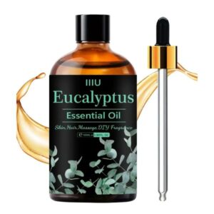 Eucalyptus and tea tree essential oil in a clear glass bottle on a serene spa-like background.