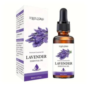 Bottle of Lavender Essential Oil for hair and skin care, placed on a wooden table with lavender flowers.