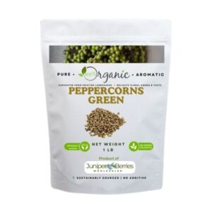 Close-up of green peppercorns showing their wrinkled texture and natural color.